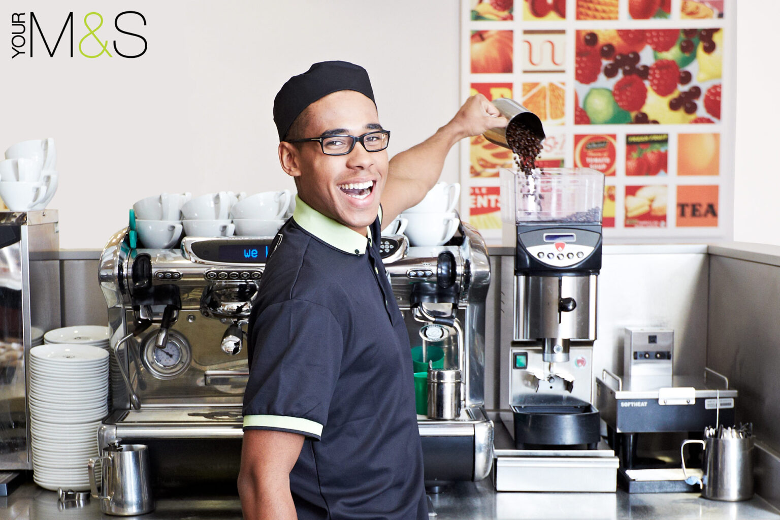 Barista making smiling in Coffeeshop. Employee brand photography.