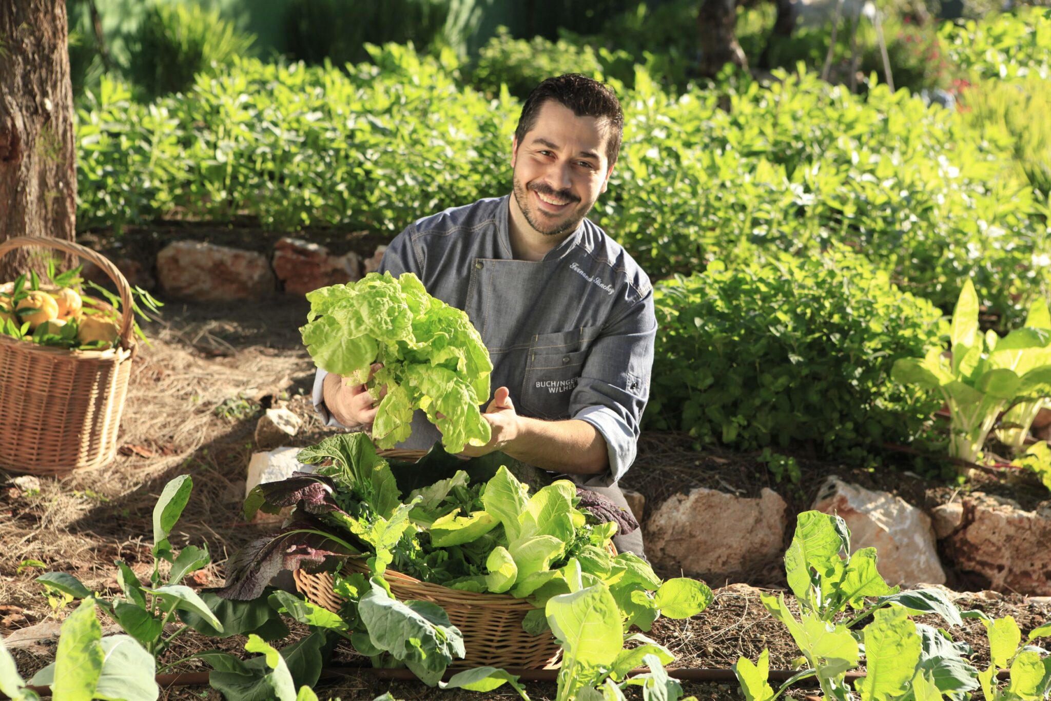 Gardner proudly showing off his crop of vegetation. Employee brand photography